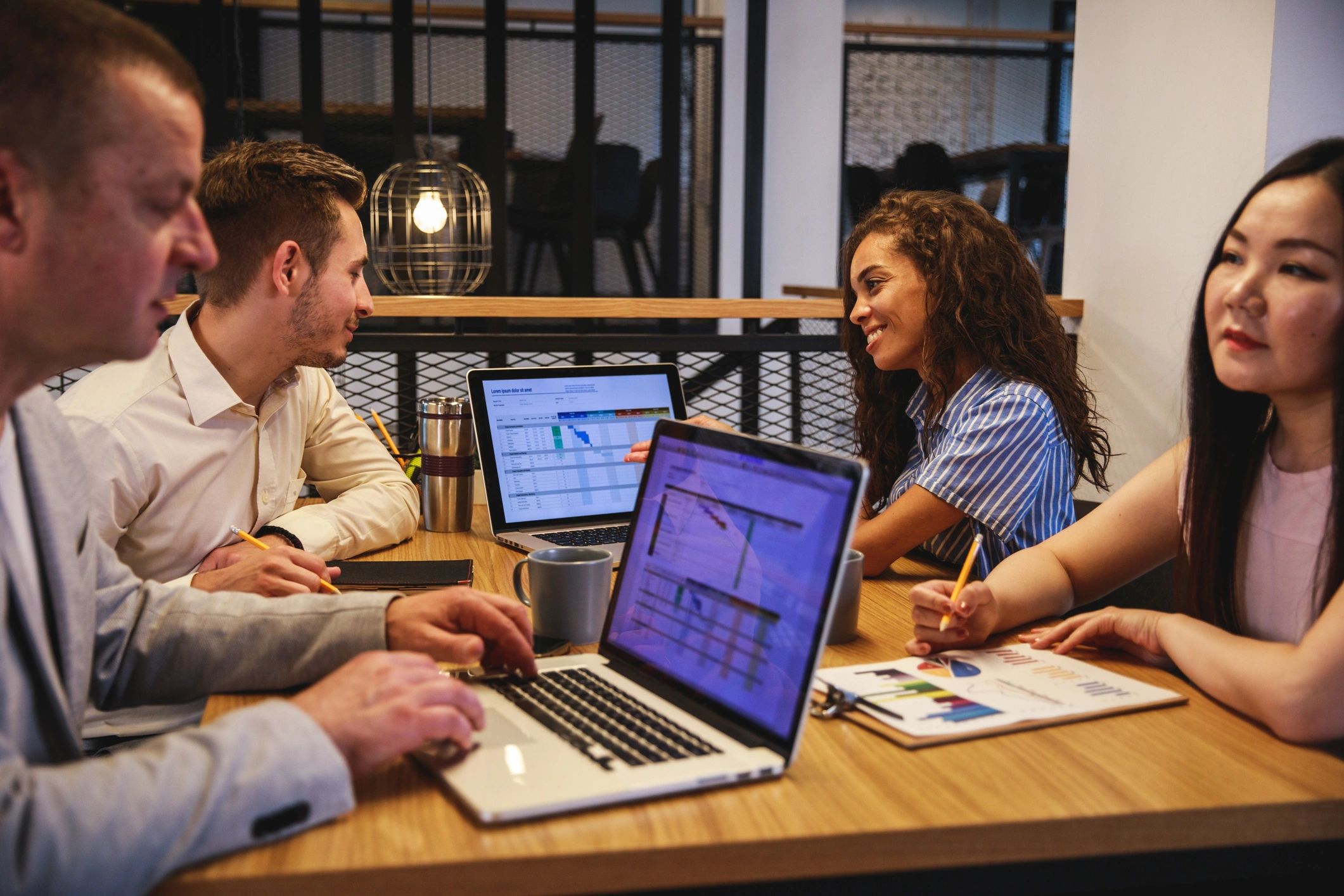 Digital marketing team meeting in a board room
