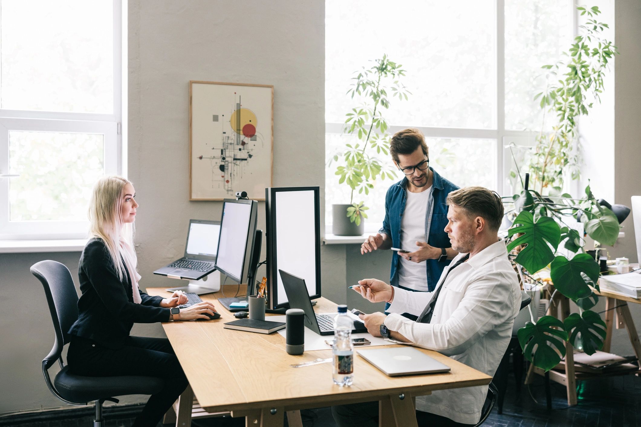 Marketing team collaborating in a modern office